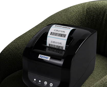 Nexo printer sitting on a couch